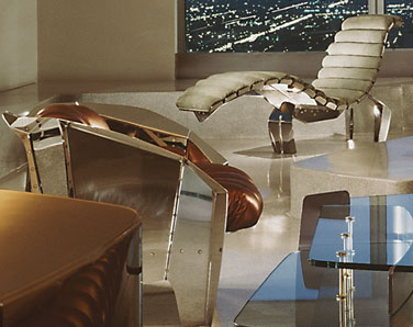 Stainless steel chaise lounge, unique Chicago Chair and metal coffee table