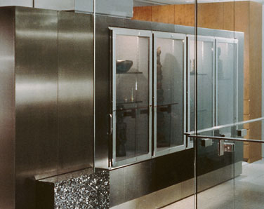 Polished stainless steel display case and cabinets
